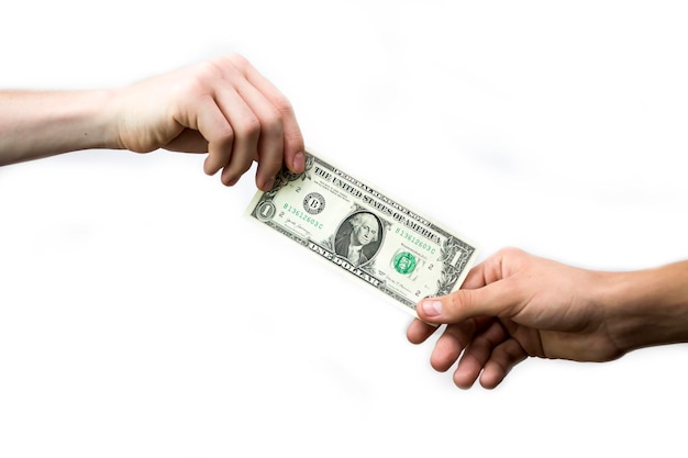 The hand passes the dollar to the other hand on a white background