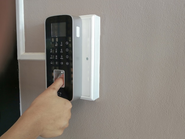 Hand of people and electronic digital door,finger print scan for unlock door security system