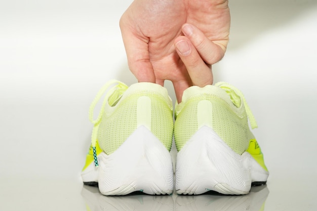 Hand pick running shoes for start exercising