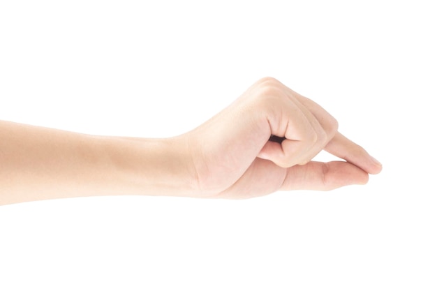 A hand picks up something with the fingers, Isolated on white background, Clipping path Included.