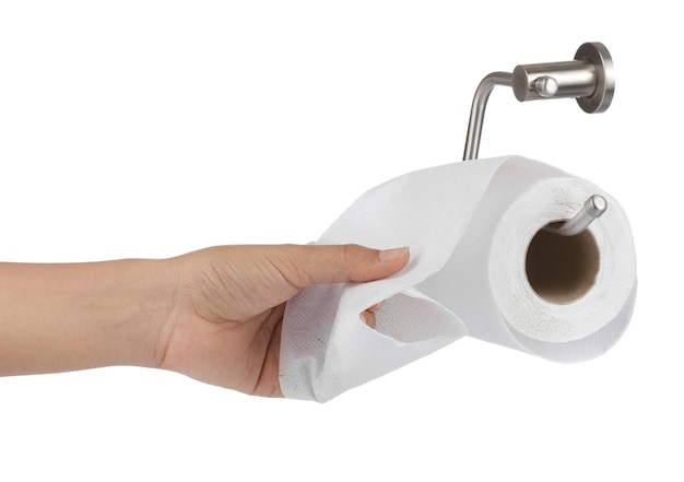 Hand picks up a tissue paper from stainless toilet
holder isolated on a white background