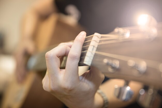 hand playing guitar