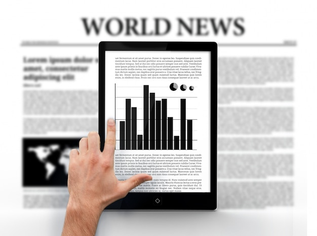 hand pointing to graph on digital tablet
