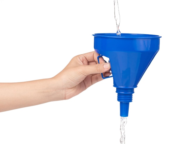 hand poured water through the funnel isolated on white background