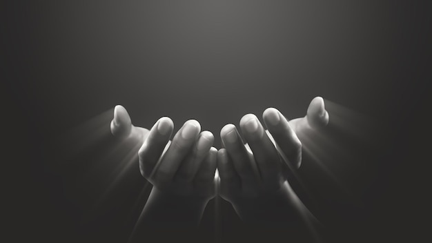 Hand prayer god faith holy worship on hope religion background of believe church pray jesus christian religious grace black white concept or love spiritual bible peace and spirit trust blessed light