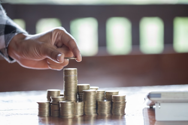 Hand put coin to money, Business idea