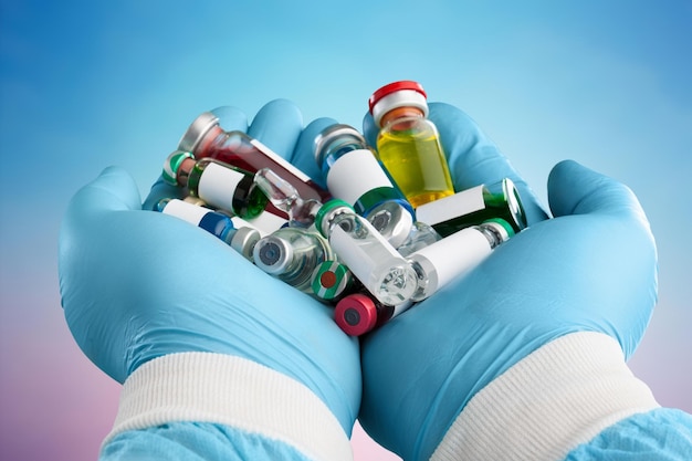 Photo hand of a researcher holding coronavirus covid-19 vaccines.