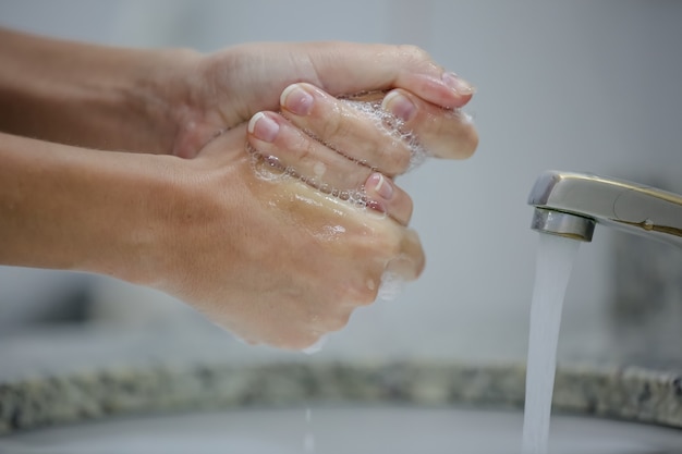 Hand sanitization at the faucet prevent covid19