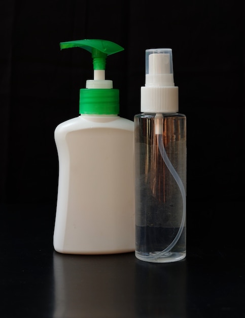 Hand sanitizer isolated on a black background