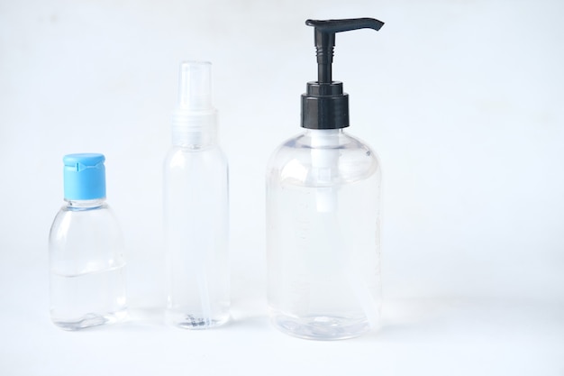 Hand sanitizers on white background close up