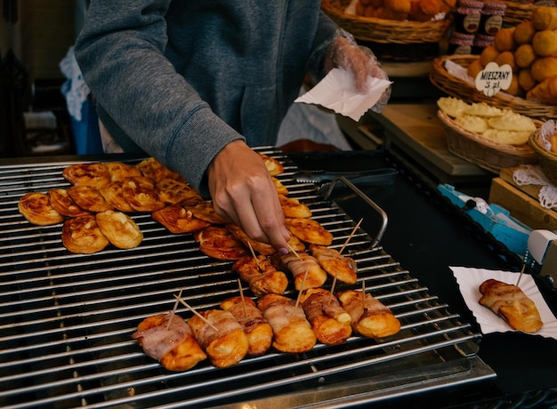 Photo hand serving at a street food market