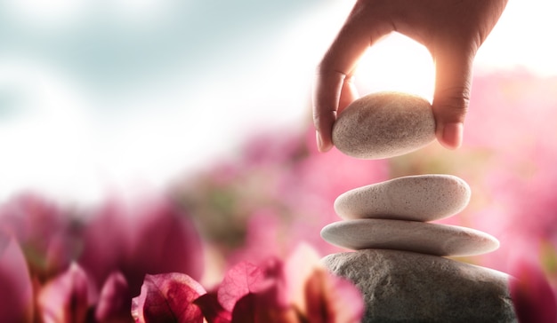 Hand setting white natural stone stack