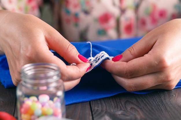 Hand sewing by woman