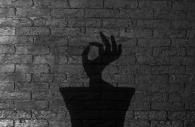 hand shadow on black background