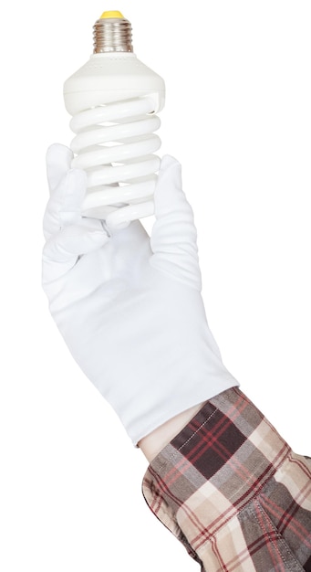 Hand in shirt and glove holds CFL lamp