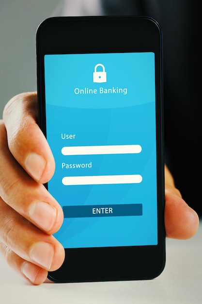 Photo hand showing smartphone against online banking