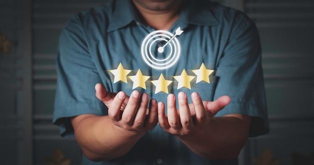 Hand shows the sign of the top service Quality assurance 5 star Customer Experience Concept Best Excellent Services for Satisfaction present by Opened Hand of Client giving a Five Star Rating