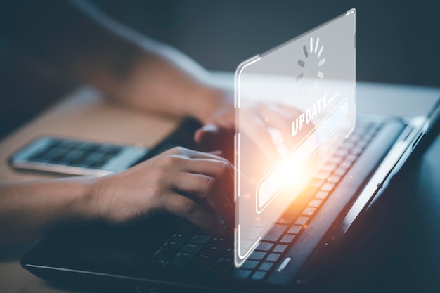 アップデートソフトウェアのハンドタッチバーコンピュータプログラムアップグレードビジネステクノロジーインターネットアップデート仮想画面インターネットおよびテクノロジーコンセプトローディングバーアップデートのインストール