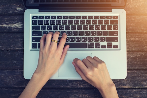 Hand touch keyboard on laptop computer