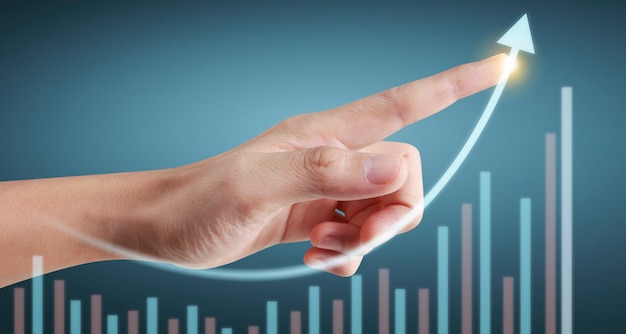 Mano che tocca i grafici dell'indicatore finanziario e del grafico di analisi dell'economia di mercato di contabilità