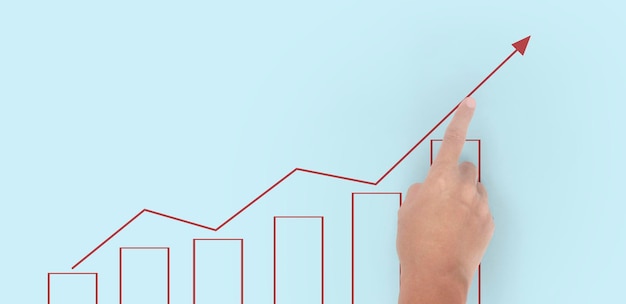 Photo hand touching graphs of financial indicator and accounting market