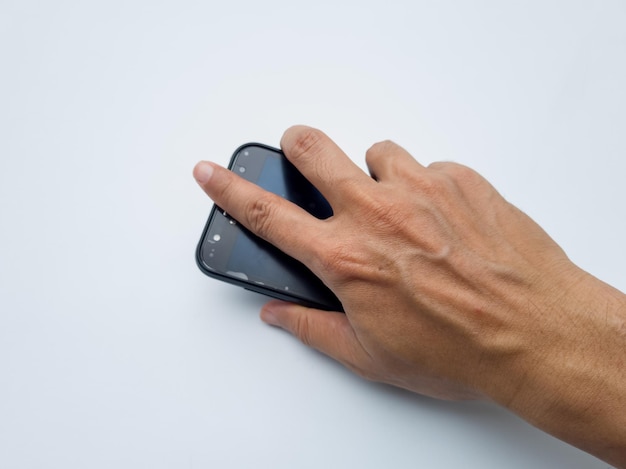 Photo hand touching smart phone isolated on white background close up shot