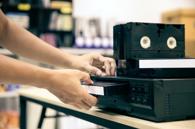 Photo hand and video record player concept of electric retro style