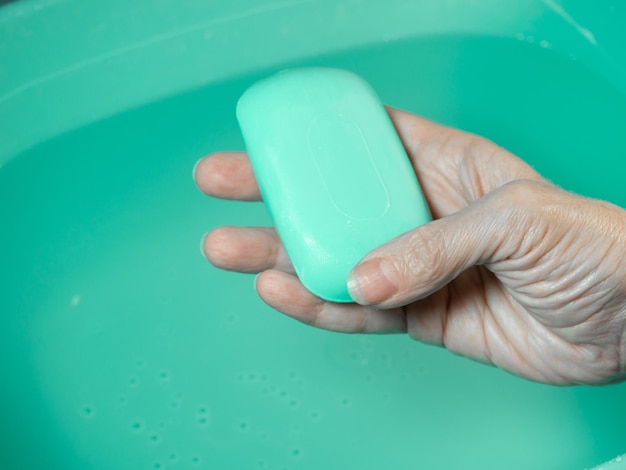 Hand washing Toilet soap in hand Green soap Hand washing