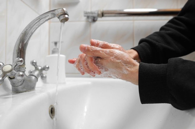 Hand washing with soap and water to prevent coronavirus Hand washing