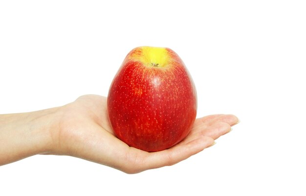 Hand with apple isolated on white background