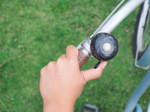 hand with bicycle handle 