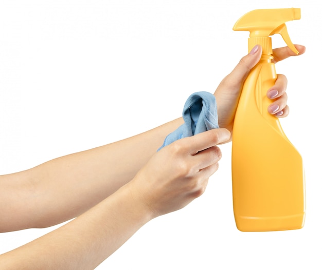 Hand with a cleaning product