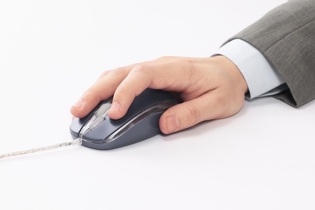 Hand with computer mouse on white background