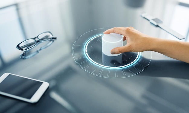 hand with control knob on interactive panel