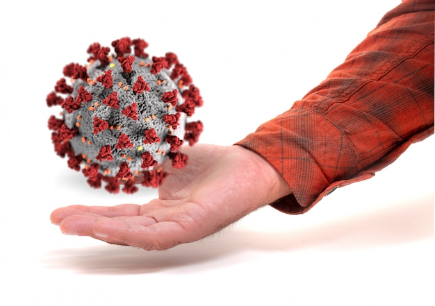 Hand with coronavirus molecule