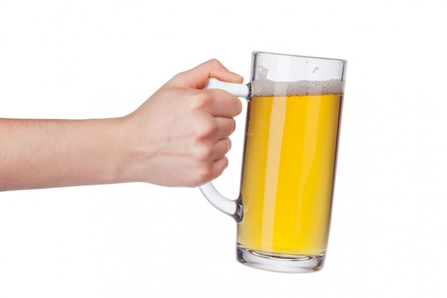 Hand with full beer glass isolated