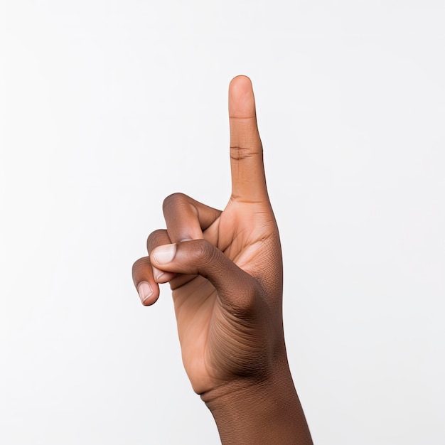 A hand with the index finger up pointing up