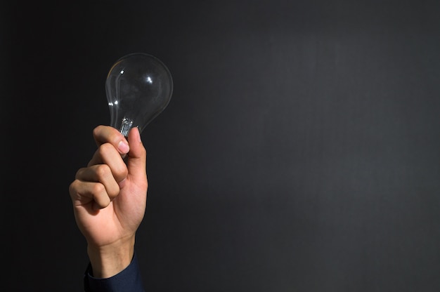 A hand with light bulb