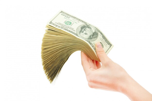 Hand with money isolated on white background