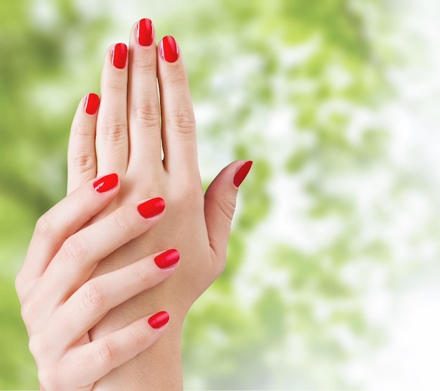 Hand with nail red manicure