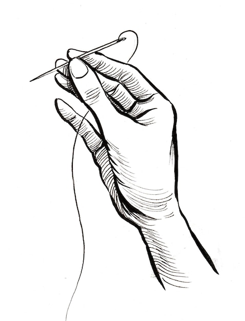 Photo hand with needle and thread. ink black and white drawing