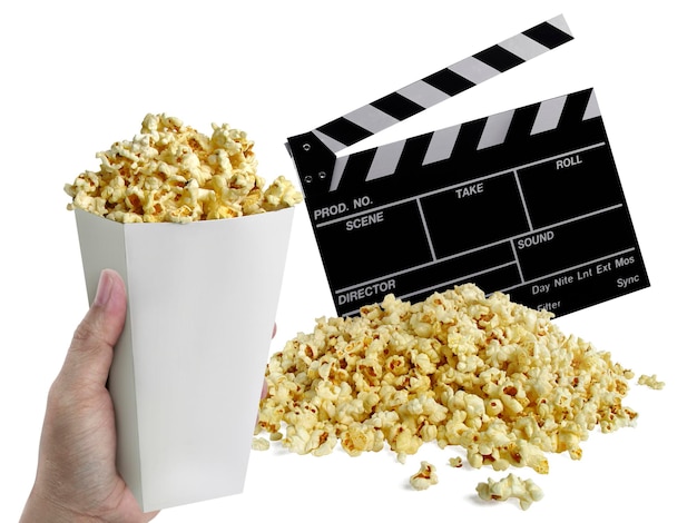 Hand with Popcorn Movie clapperboard isolated on white