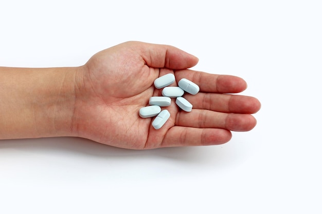 Hand with PrEP pills HIV prevention