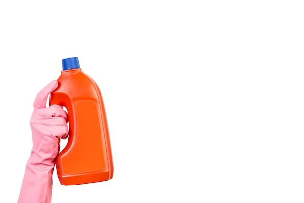 Photo hand with rubber glove holding cleaning product bottle on a white background with copy space