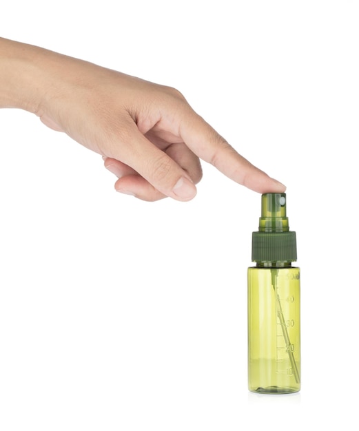 Hand with Small Watering Can Spray Bottle isolated on white background