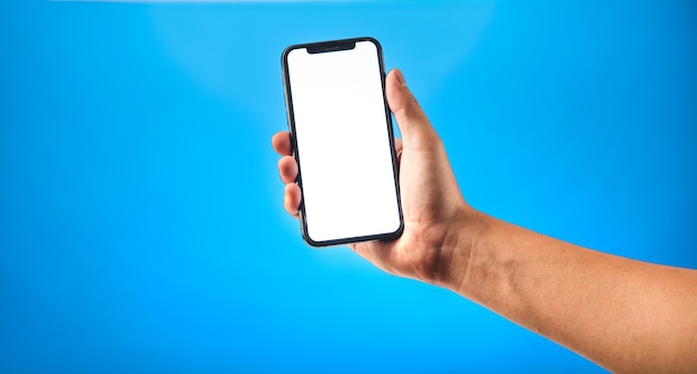 A hand with a smartphone