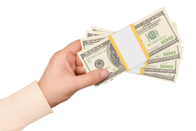 Hand with stacks of one hundred dollars banknotes