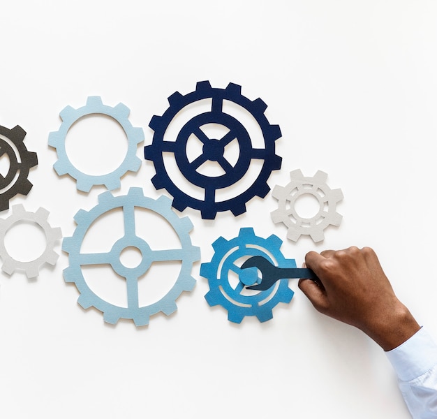 Hand with support gears isolated on white background