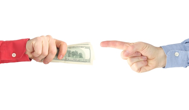 the hand with the writing pen reaches for the hand with the money. payment for work.