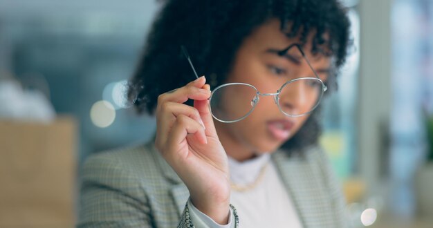 Photo hand woman and holding glasses with reading focus and business strategy in office or corporate workplace professional employee and eyewear with ideas planning and vision for proposal at work